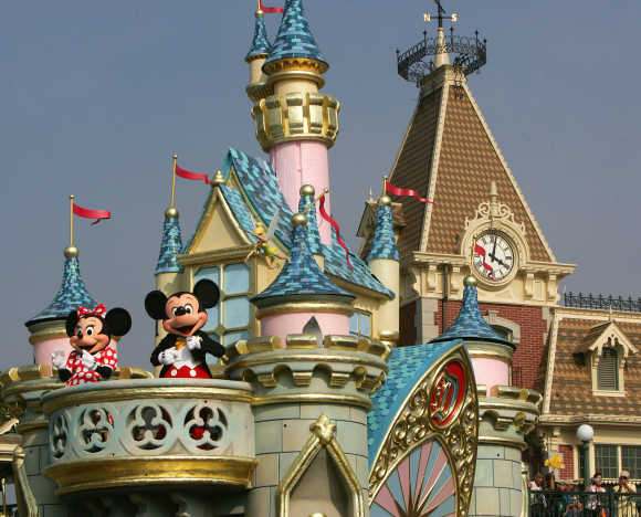 Micky Mouse and Minnie Mouse perform during 'Disney On Parade' at Hong Kong Disneyland.