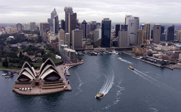 Aerial of Sydney Harbour Bridge and cityscape.