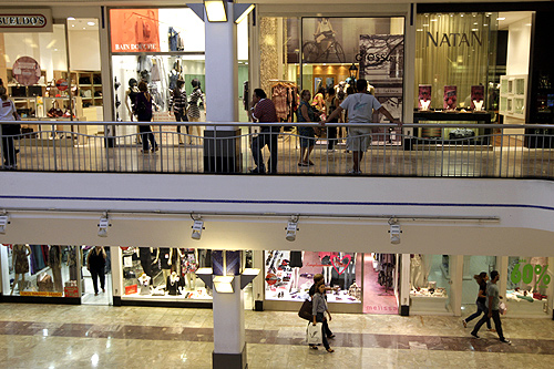 Shoppers walk in a mall in Refice, northeast Brazil.