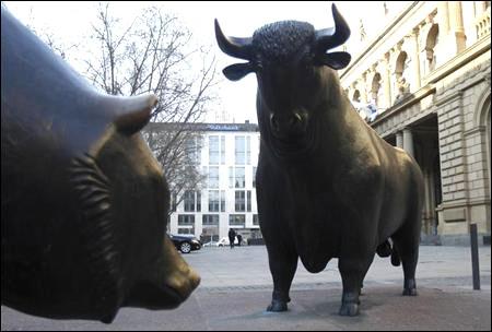 Bull and bear statues are pictured outside Frankfurt's stock exchange.