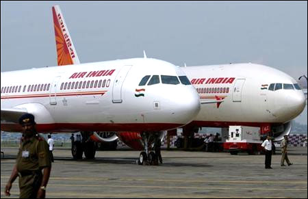 Air India's Airbus A321 (L) and Boeing 777-200 LR aircraft.