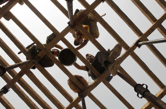 Labourers have lunch at a construction site in Sidon, southern Lebanon.