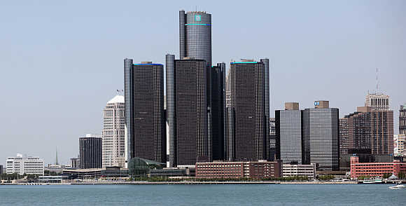 The city of Detroit skyline, including General Motors Global Headquarters, is seen along the Detroit River from Windsor, Canada.