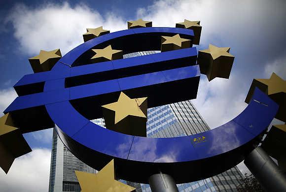 Euro currency sign is seen in front of the European Central Bank headquarters in Frankfurt.