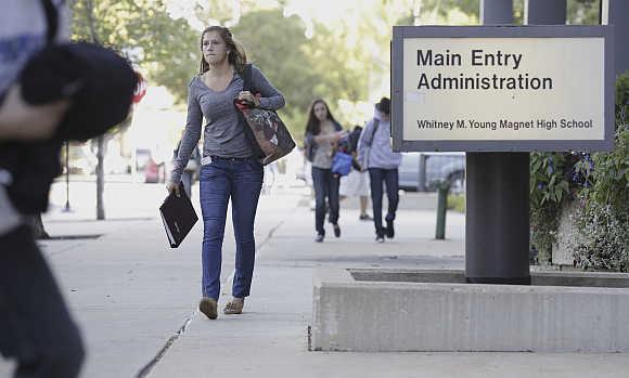 Students make their return to Whitney Young High School in Chicago.