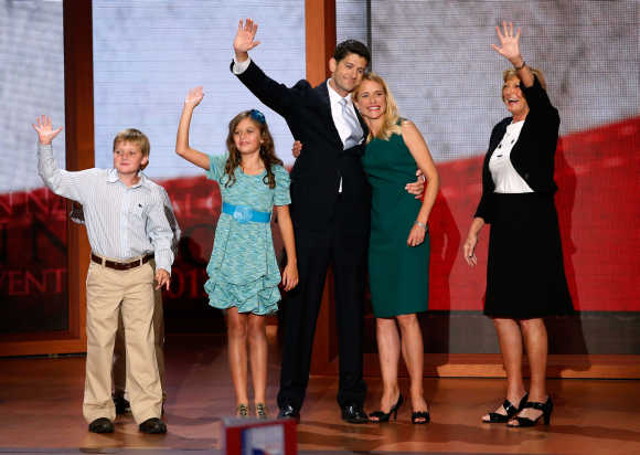 Republican Vce-Presidential nominee Paul Ryan waves with his son Charlie, his daughter Liza, his wife Janna and mother Betty Douglas after accepting the nomination during the third session of the Republican National Convention in Tampa, Florida.