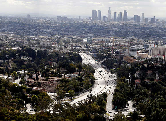 The skyline of downtown Los Angeles and the 101 Hollywood Freeway, a busy commuter route, is pictured from Mulholland Drive, United States.