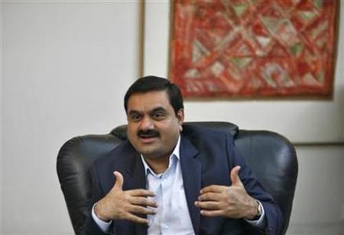 Billionaire Gautam Adani speaks during an interview.