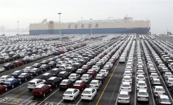 Cars made by Hyundai Motor are seen at a ship yard.
