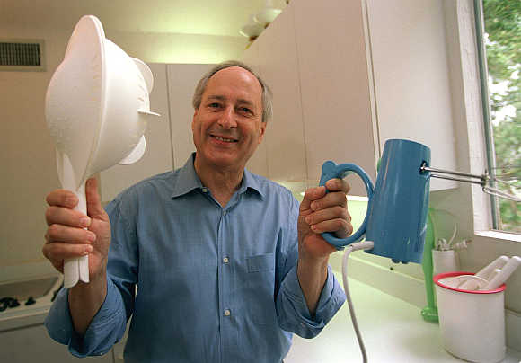 A Tupperware Corporation's official shows off some of the newest product designs.