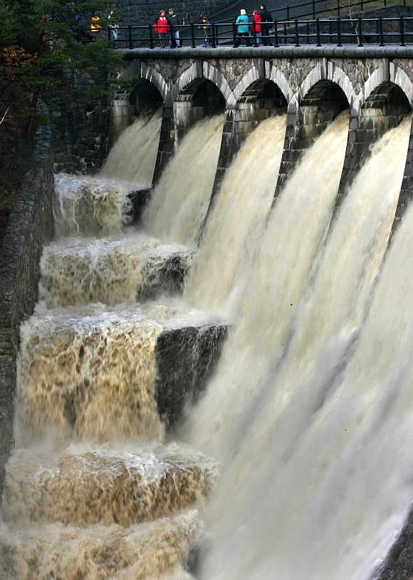 A bird flies over the spillway of the Sayano-Shushenskaya hydroelectric power station near the settlement of Cheryomushki in Khakassia region, Russia.