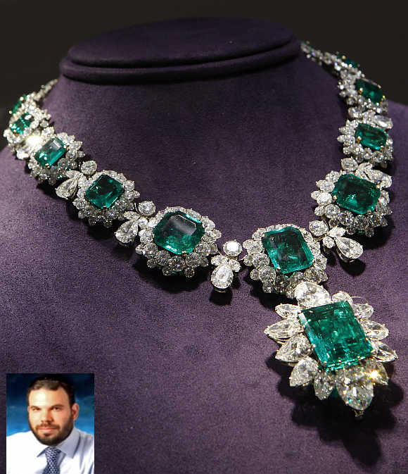 An emerald and diamond pendant and necklace by Bvlgari priced between $2.5 million to $3.5 million, which was a gift from Richard Burton to Elizabeth Taylor, on display in New York City. Inset, Dan Gertler.