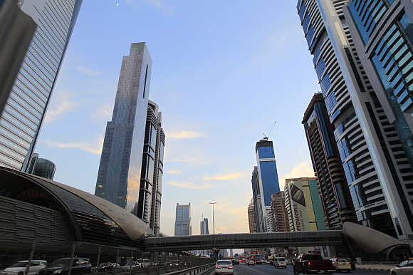 Towers are seen next to a Dubai Metro station on Sheikh Zayed Road.