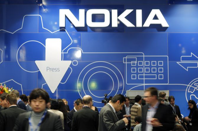People visit the Nokia area at the Mobile World Congress in Barcelona.