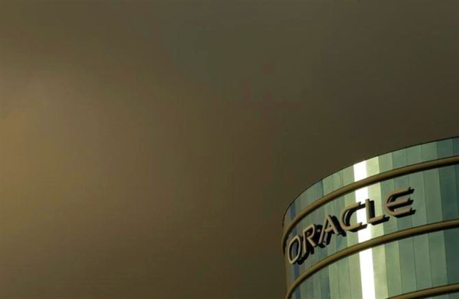 The company logo is shown at the headquarters of Oracle Corporation in Redwood City, California.