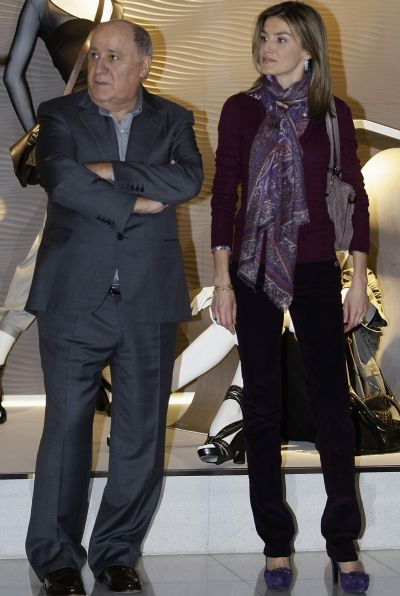 Spain's Princess Letizia (R) stands next to chairman of Spanish global fashion giant Inditex, Amancio Ortega, during a visit to an Inditex factory in Coruna, northern Spain.