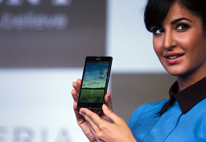 Katrina Kaif displays the Sony Xperia Z during its launch in New Delhi.