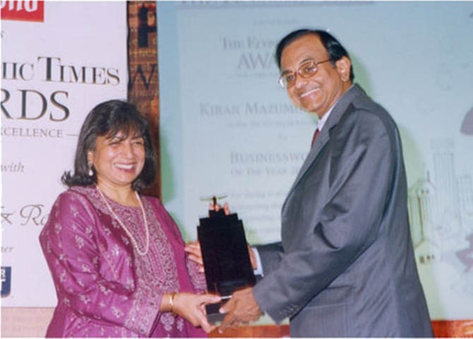 Kiran Mazumdar-Shaw receives an award from Finance Minister P Chidambaram.