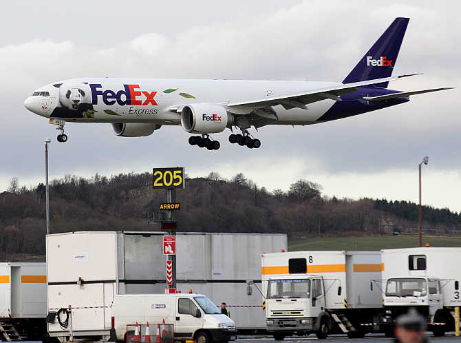 FedEx Panda Express aircraft carrying giant pandas Tian Tian and Yang Guang lands at Edinburgh airport in Scotland.