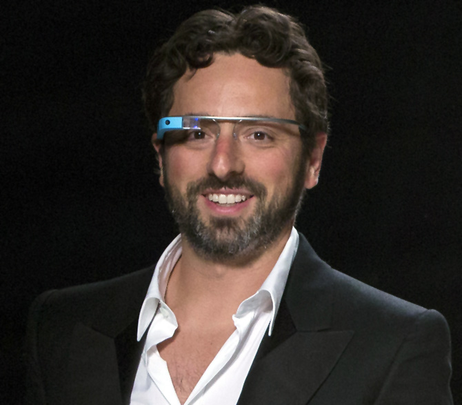 Google co-founder Sergey Brin walks the runway wearing new product Glass by Google after the Diane von Furstenberg Spring/Summer 2013 collection show during New York Fashion Week.