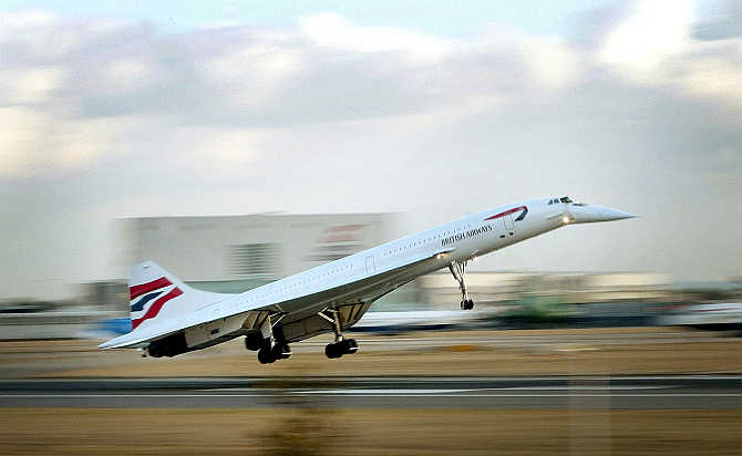 The last British Airways passenger Concorde flight lands at London's Heathrow airport from New York on October 24, 2003.