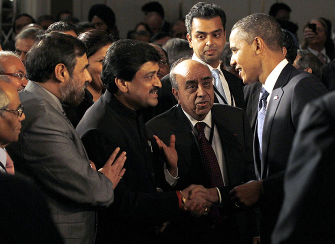 U.S. President Barack Obama meets members of the audience after delivering remarks at the U.S.-India business council and entrepreneurship summit in Mumbai.