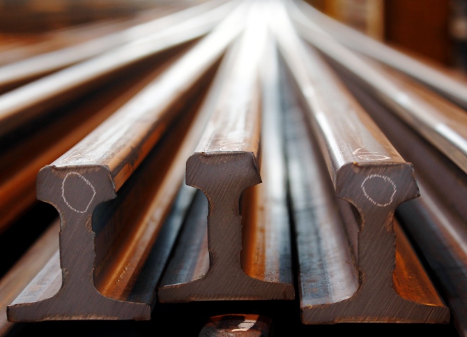 Rails are seen before finishing touches at a Tata Steel rails factory.