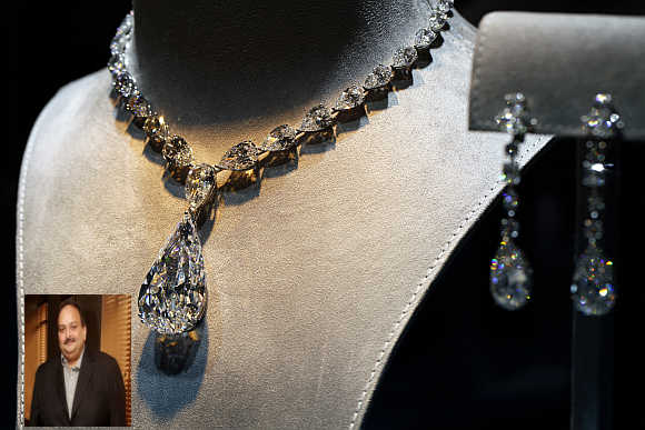 Octagonal Star of America, a 100.57-carats, flawless D colour necklace, is displayed in Hong Kong. Mehul Choksi, inset.