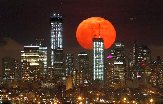 The moon rises over the skyline of Manhattan in New York - the city used as a base for the survey.