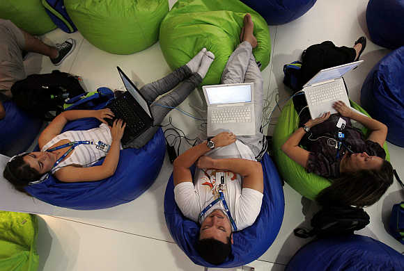 People surf the web during a campus party in Sao Paulo, Brazil.