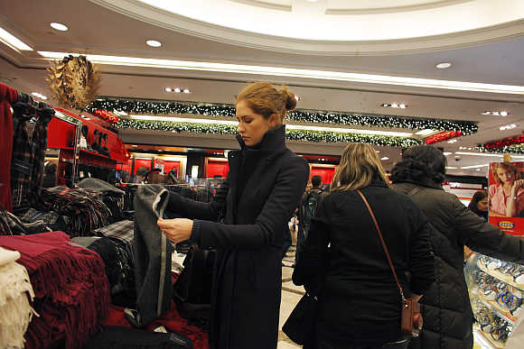 A woman shops inside Macy's Manhattan department store in New York.