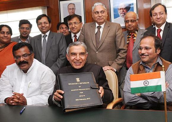 Railway Minister Pawan Kumar Bansal with Ministers of State for Railways, K.J. Surya Prakash Reddy, Adhir Ranjan Chowdhury, Chairman, Railway Board, Vinay Mittal.