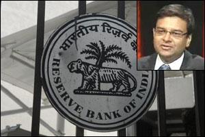 RBI logo and Urjit Patel