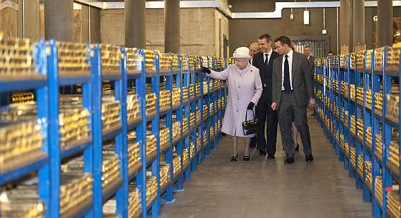 Britain's Queen Elizabeth tours a gold vault during a visit to the Bank of England in the City of London.