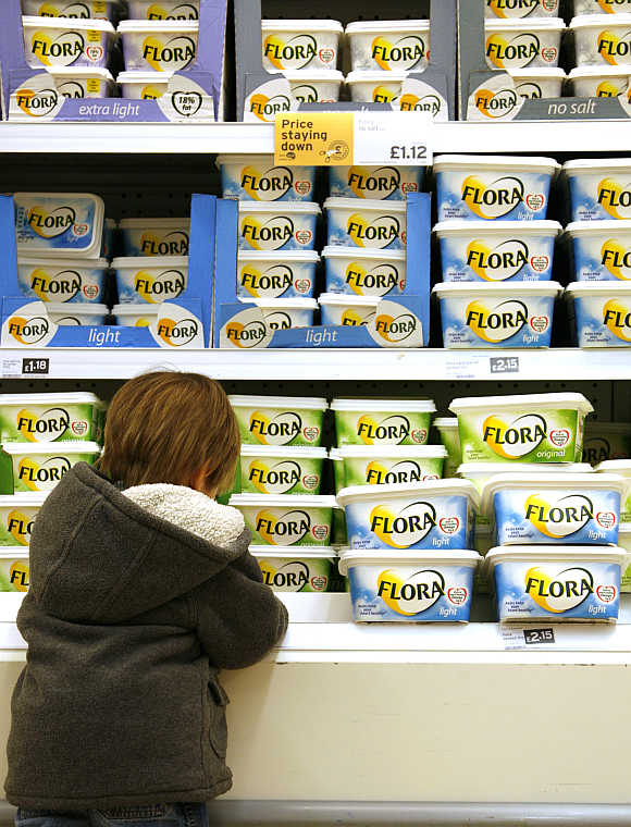 A chiller cabinet of Flora margarine, which is owned by Unilever, at a Sainsbury's supermarket in London.
