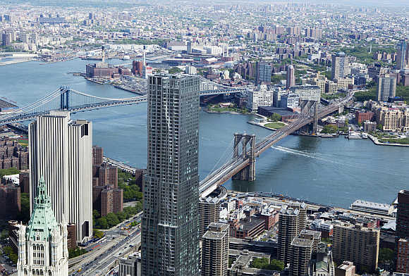Brooklyn Bridge and Manhattan Bridge is seen from the 90th storey of One World Trade Center in New York.