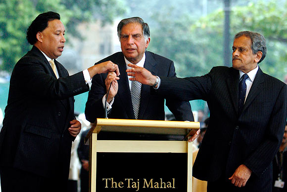 Ratan Tata with Raymond Bickson, left, managing director, Taj Hotels, and R K Krishnakumar, then vice-chairman, Indian Hotels, at the reopening of the Taj Mahal hotel in Mumbai , December 21, 2008 after the 26/11 terrorist attacks.