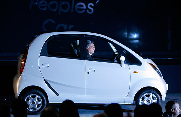 Ratan Tata with his dream project, the Nano, January 10, 2008.