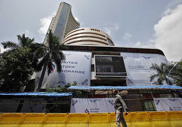 A man walks past the BSE building in Mumbai.