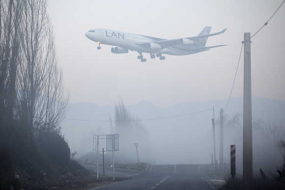 A LAN Airlines plane lands at Santiago's international airport, Chile.