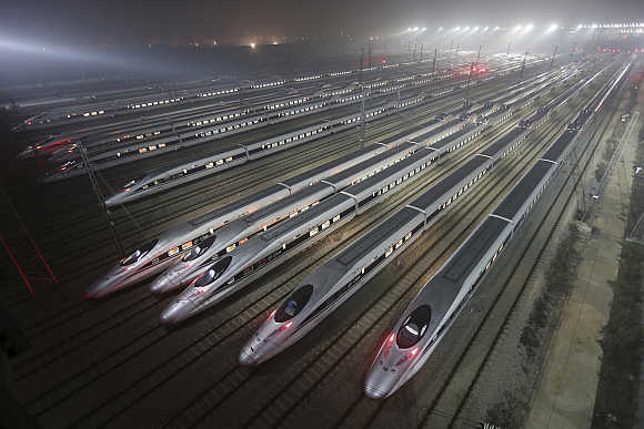 CRH380 (China Railway High-speed) Harmony bullet trains are seen at a high-speed train maintenance base in Wuhan, Hubei province.