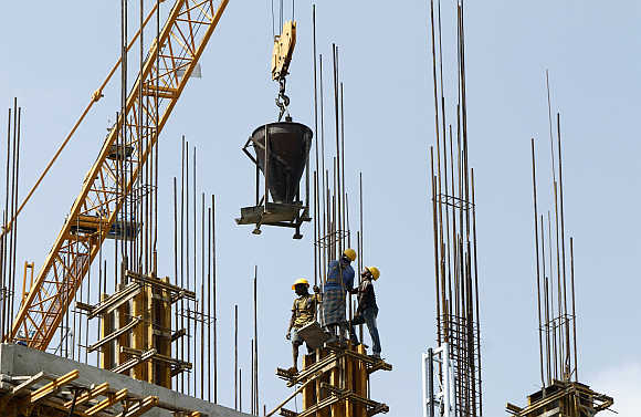 Labourers at a construction site of a commercial complex in Chennai.