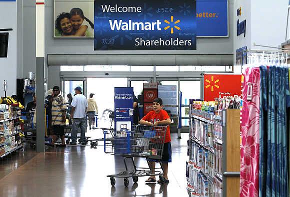 A customer shops at a Walmart Supercenter in Rogers, Arkansas.