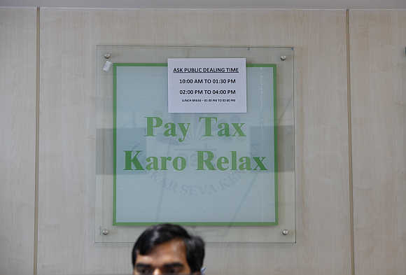 An employee works inside Income Tax office in New Delhi.