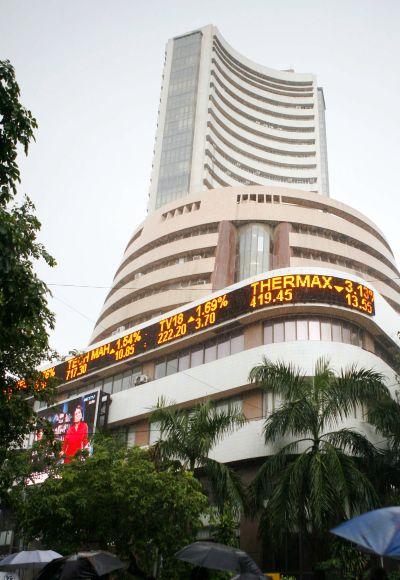 People walk past the Bombay Stock Exchange building.