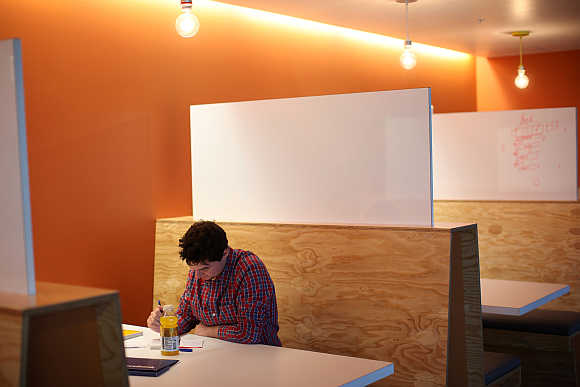 A Facebook employee works in the design studio at the company's headquarters in Menlo Park, California.