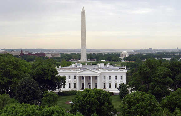 White House with the Washington Monument, left, behind it and the Jefferson Memorial, right, in Washington, DC.