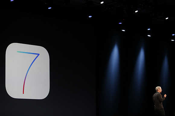 Apple CEO Tim Cook introduces iOS 7 during the Apple Worldwide Developers Conference 2013 in San Francisco, California.
