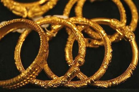 Gold jewellery is displayed in a shop in Kolkata.