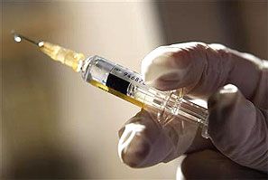 A doctor prepares a syringe in a municipal vaccination centre. Photograph: Eric Gaillard/Reuters